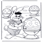 Osterhase malt Eier